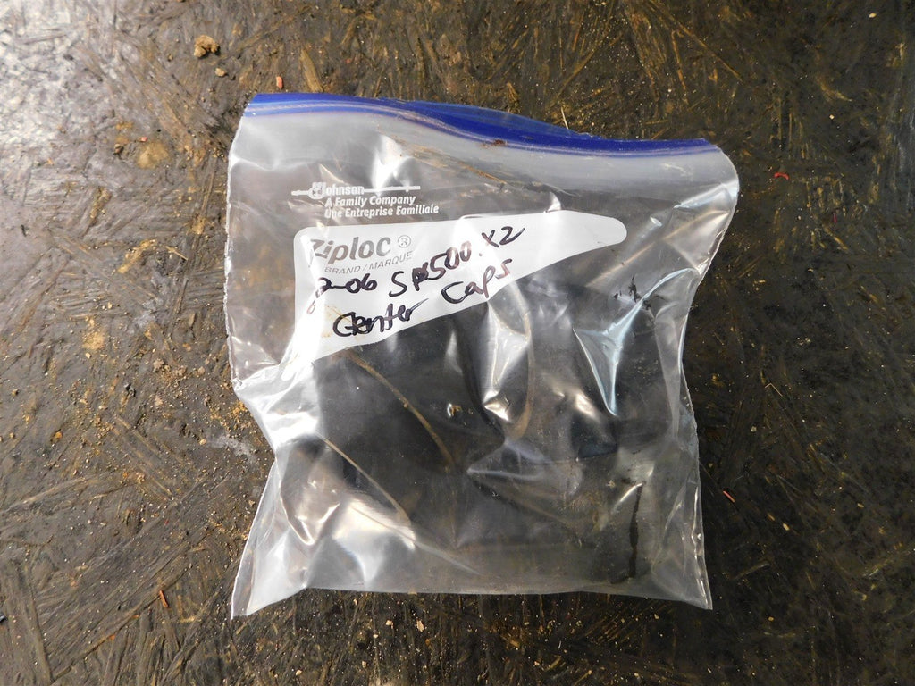 2006 Polaris Sportsman 500 x2 (2up) EFI Center Hub / Dust Caps
