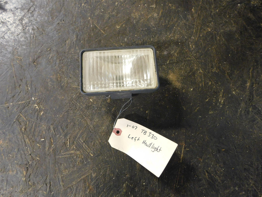 2007 Polaris Trail Boss 330 Left Headlight