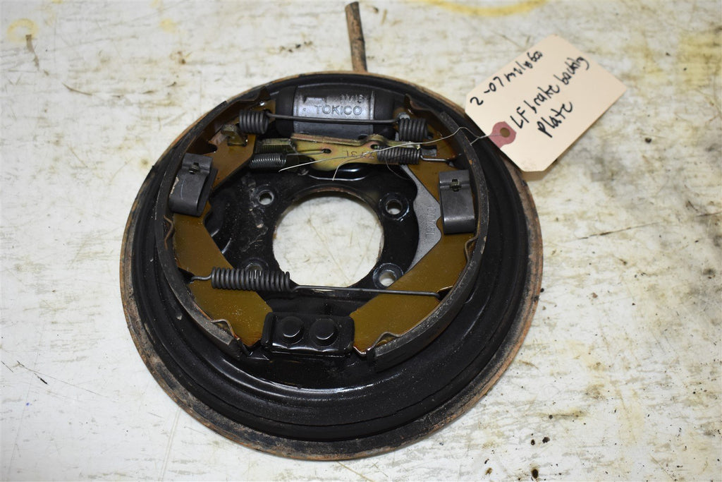 2007 Kawasaki Mule 610 4x4 Left Front Brake Backing Plate 41035-0009